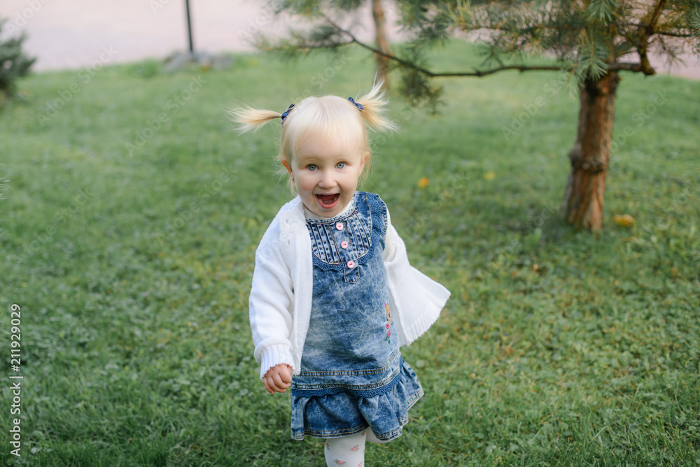 Portrait of a lovely little girl with emotions of happiness on the face Portrait of a lovely little girl with emotions of happiness on the face