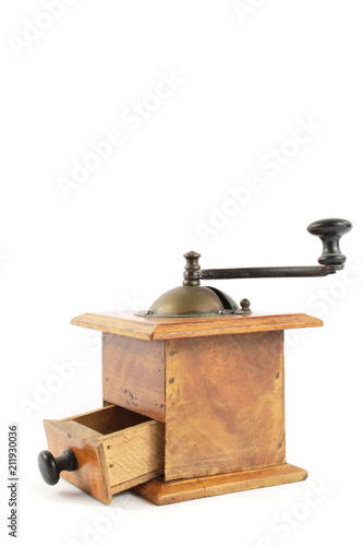 Small Wooden Manual Coffee Grinder on White background