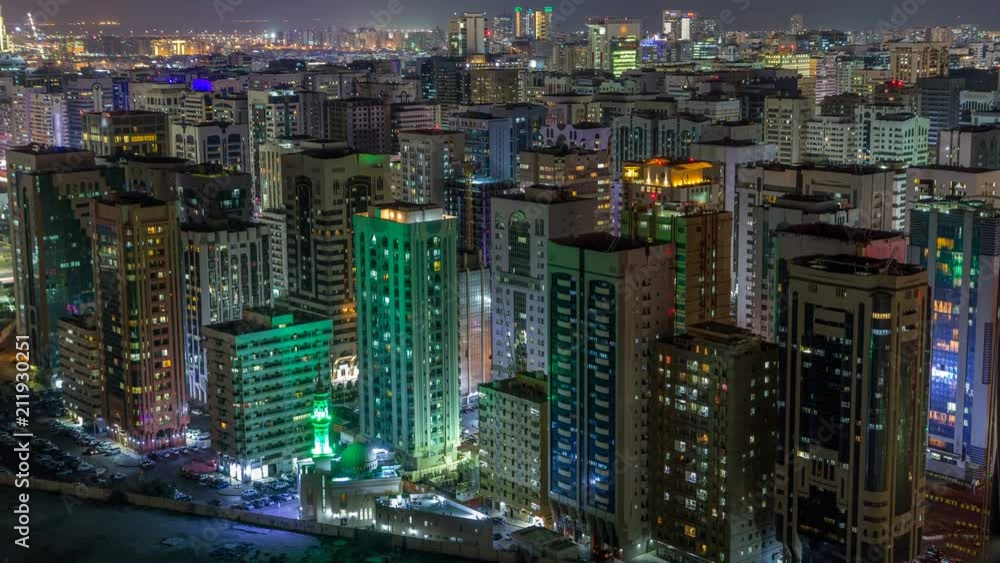 Aerial skyline of Abu Dhabi city centre from above night timelapse Aerial skyline of Abu Dhabi city centre from above night timelapse