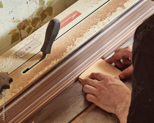 Lautner makes a classic guitar. Fitting the headblock part in shape. photo