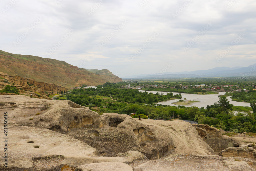 View on the Kura river and Caucasus mountains from Ancient cave city Uplistsikhe, Georgia View on the Kura river and Caucasus mountains from Ancient cave city Uplistsikhe, Georgia