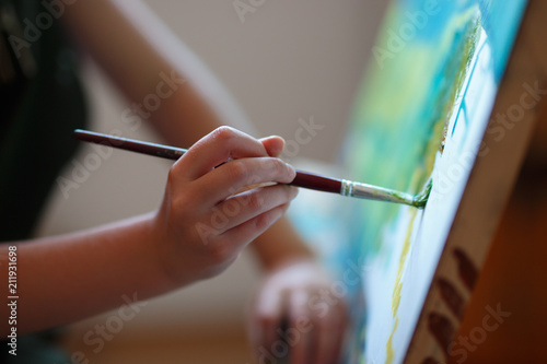 Slika na platnu Preschool girl painting in art class