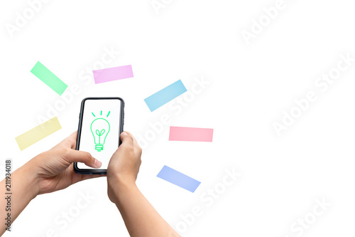 Conceptual hand holding cell phone with digital icon isolated