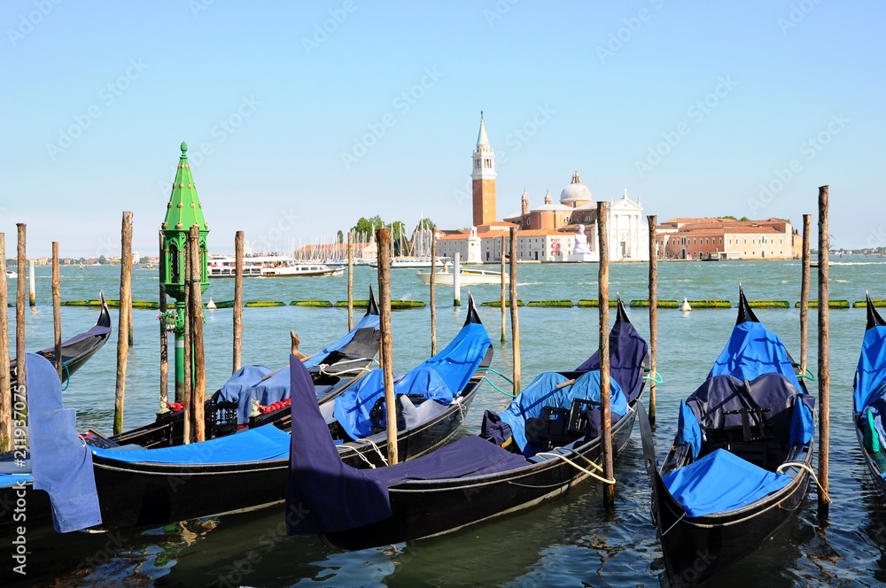 Gondolas on the Grand Canale and architectures in Venice, Italy