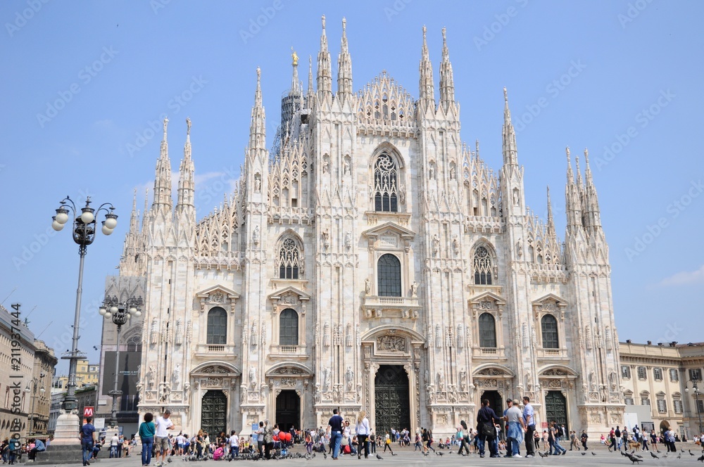 Milan Cathedral with beautiful sculptures and the square in Milan, Italy