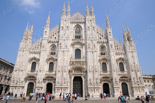 Milan Cathedral with beautiful sculptures and the square in Milan, Italy