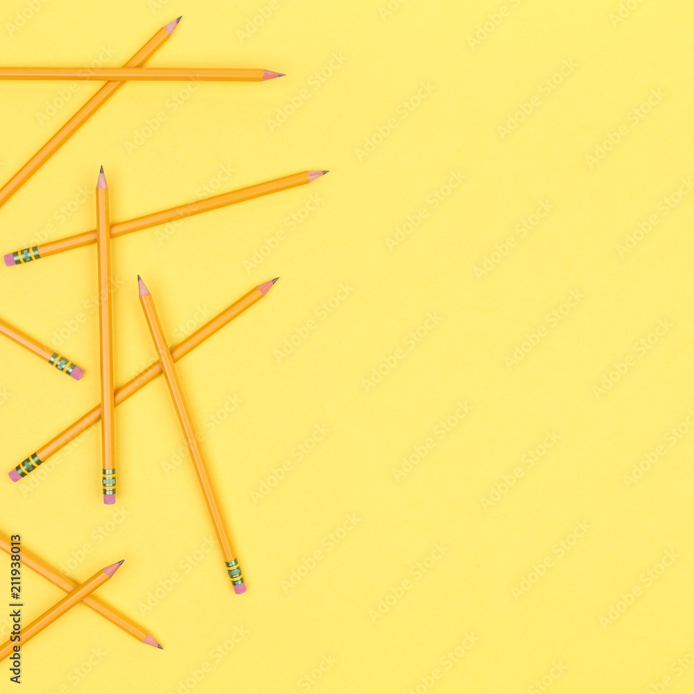 Pencils on a yellow background. Back to school concept Pencils on a yellow background. Back to school concept