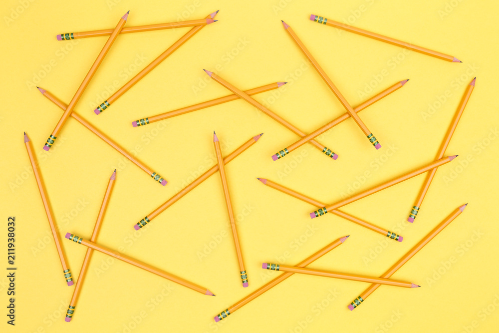 Pencils on a yellow background. Back to school concept Pencils on a yellow background. Back to school concept