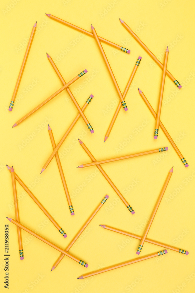 Pencils on a yellow background. Back to school concept Pencils on a yellow background. Back to school concept
