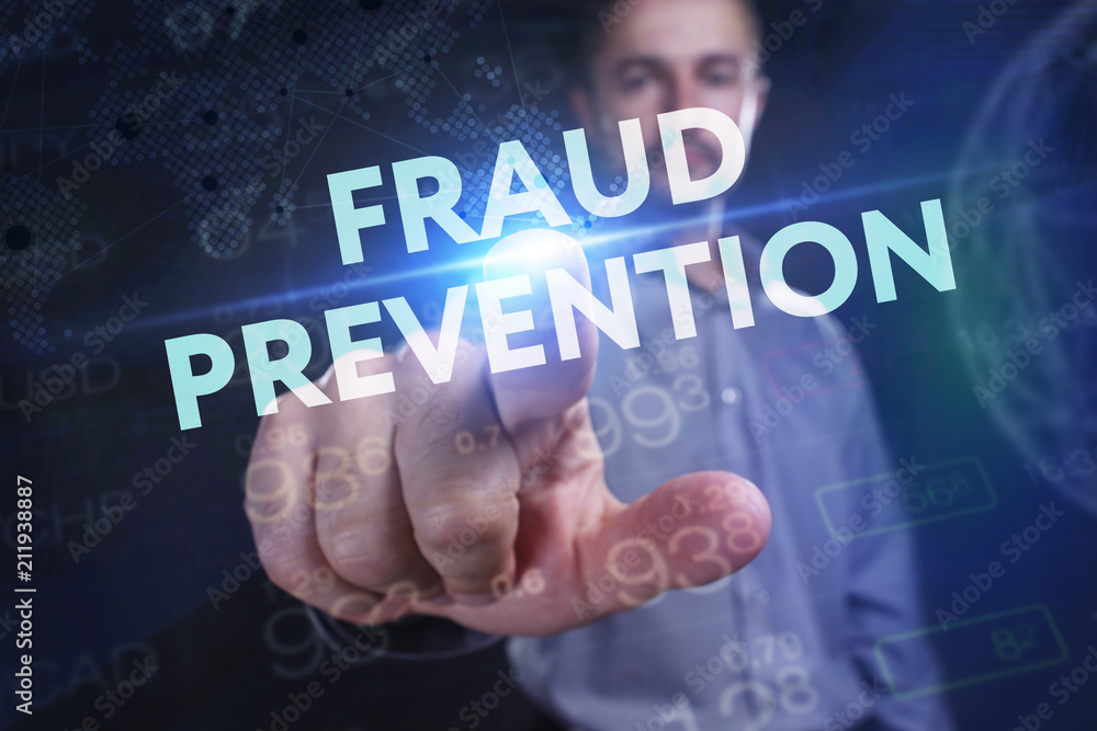 The concept of business, technology, the Internet and the network. A young entrepreneur working on a virtual screen of the future and sees the inscription: Fraud prevention