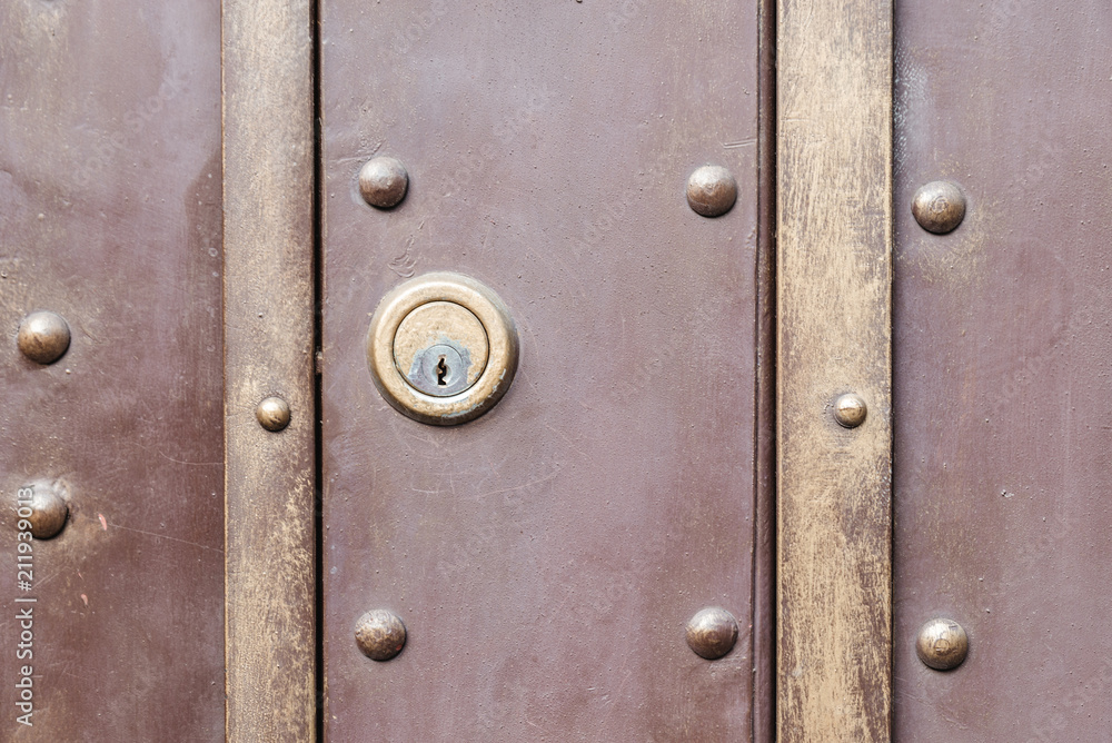 old vintage wooden doors close up with lock