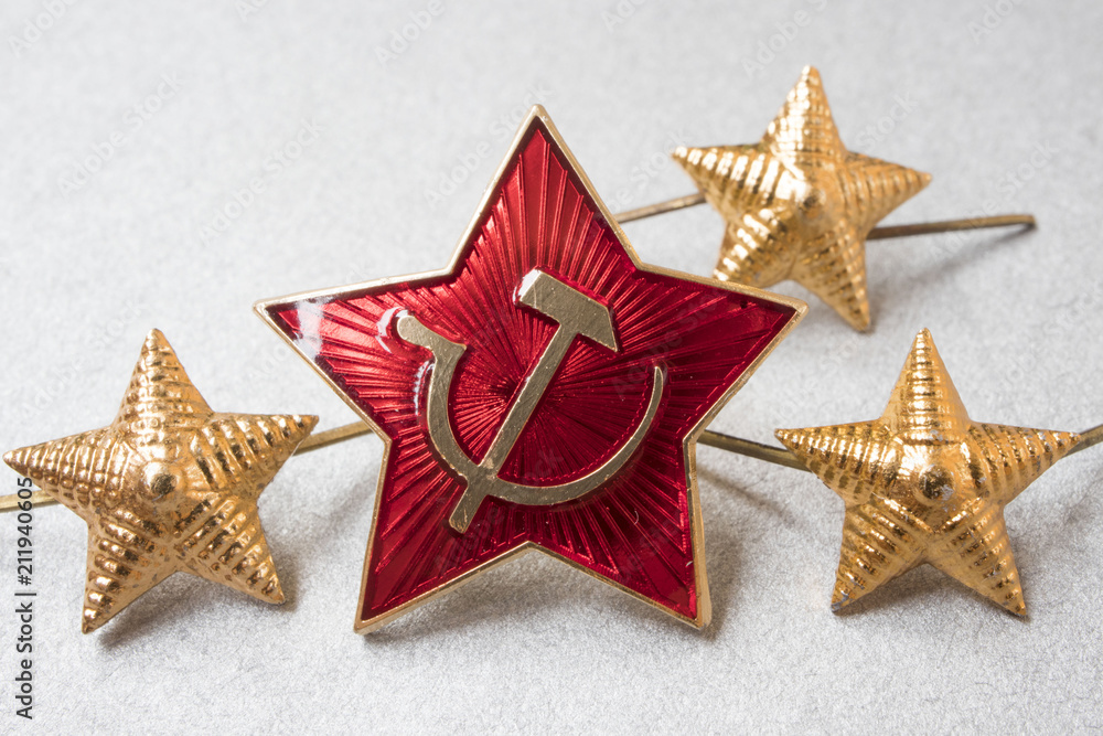 hammer and Sickle icon and stars of the Soviet army, macro photo hammer and Sickle icon and stars of the Soviet army, macro photo
