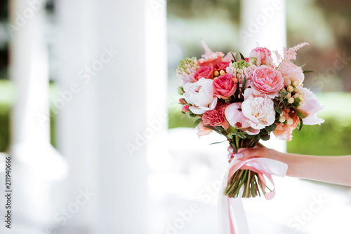 Flower bouquet in woman hand