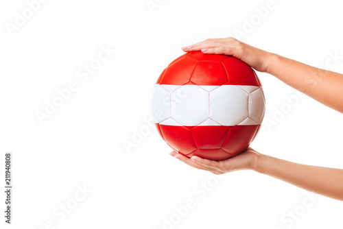 Woman hands holding soccer ball. photo