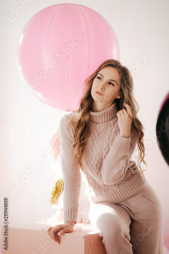 Young woman with big balloons photo