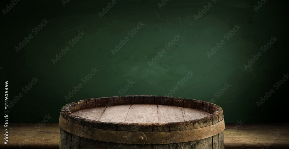 Fototapeta premium background of barrel and worn old table of wood