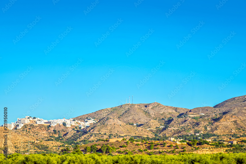 Panoramic view to the mountains in motion