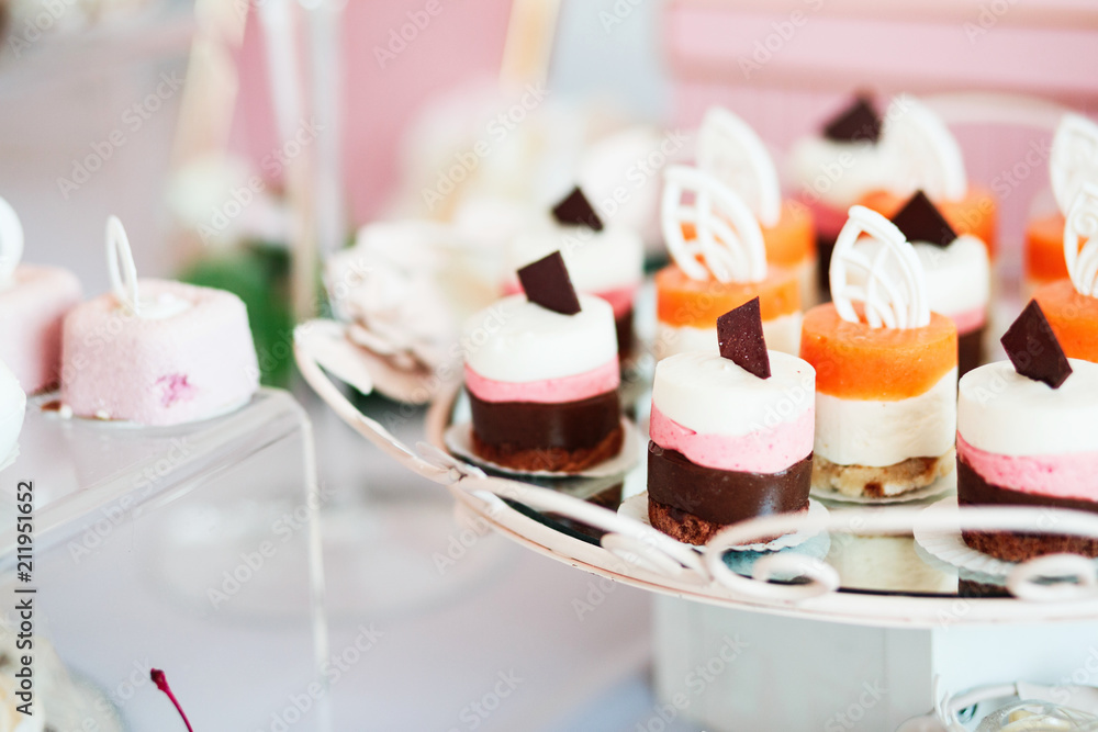 Sweet holiday buffet with cupcakes and other desserts.