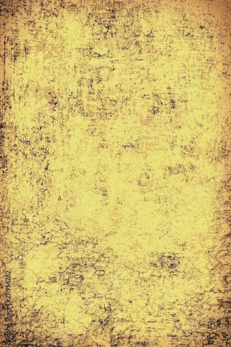 The texture of old yellow paper. Abstract grunge background
