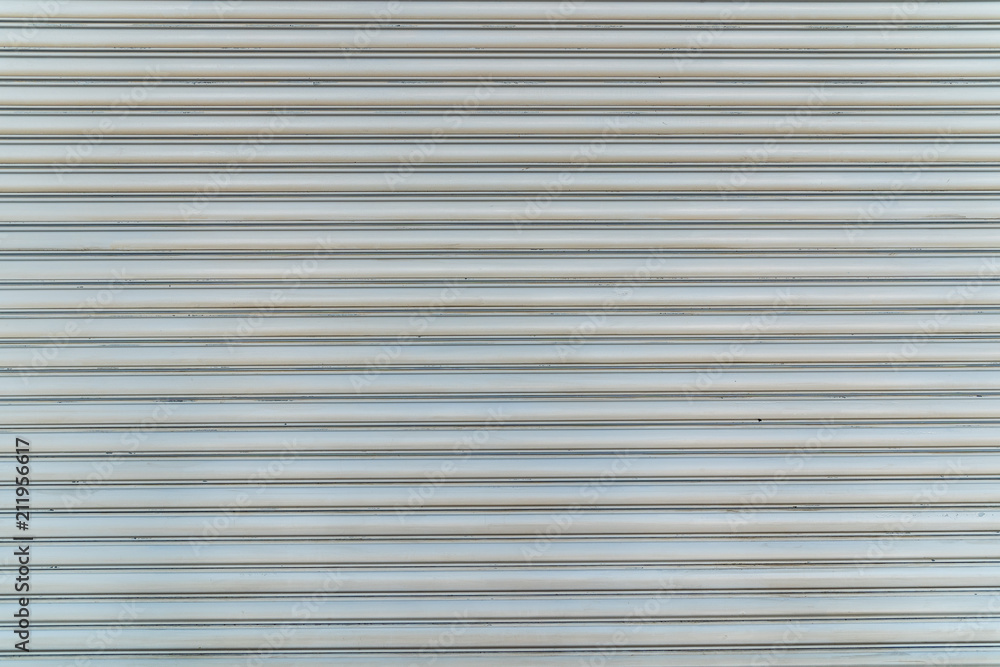 Texture of white Steel roll door horizontal line. Texture of white Steel roll door horizontal line.