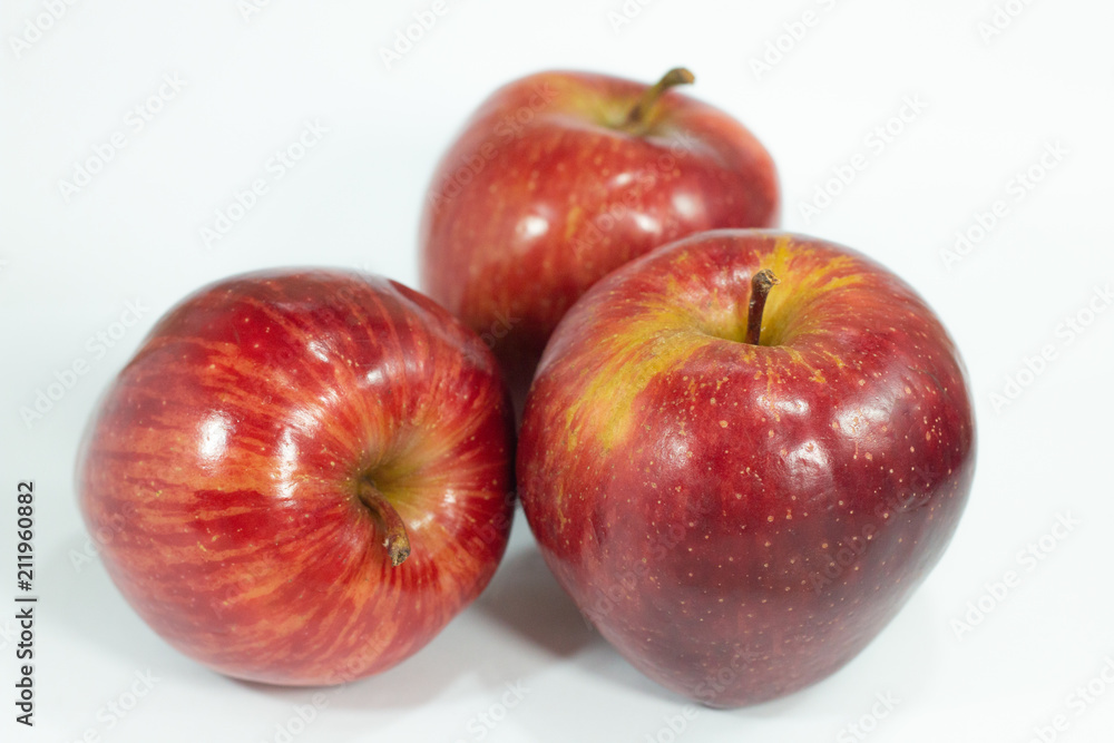 close up group of fresh red apples on white background