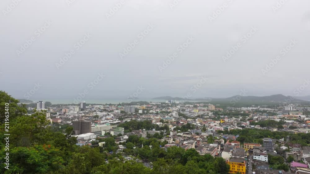 Phuket town ,wide angle view. Phuket city from mountain view point seeing downtown and andaman coastline with grey cloud sky in rainy season,4K video. Phuket town ,wide angle view. Phuket city from mountain view point seeing downtown and andaman coastline with grey cloud sky in rainy season,4K video.