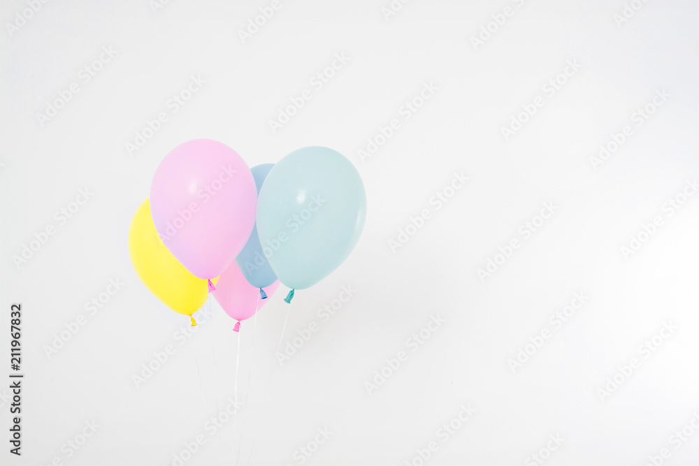 Colorful party balloons background. Isolated on white. Copy space