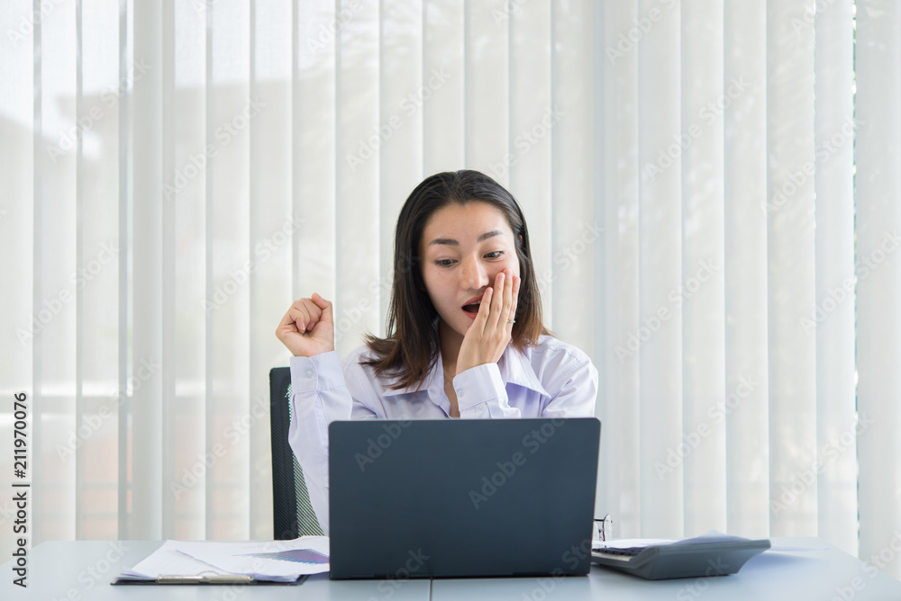 Asian business woman happy in a office,Worker success from work,Thailand people,Happiness girl concept Asian business woman happy in a office,Worker success from work,Thailand people,Happiness girl concept
