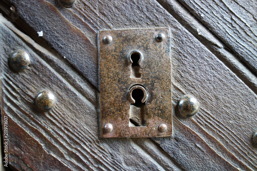 A old steel lock in a doorway entrance