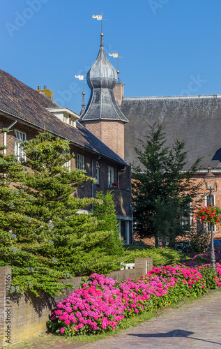 Pink flowers in front of the castle of Coevorden, Netherlands photo