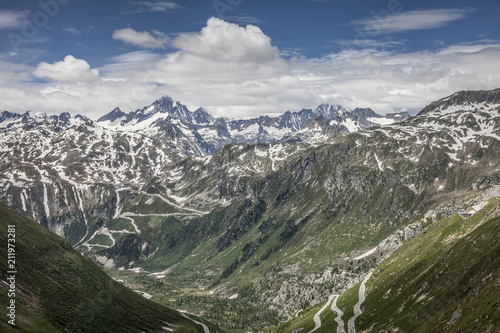 Furka Pass and Grimsel Pass in the swiss alps in early summer with still snow on the mountains