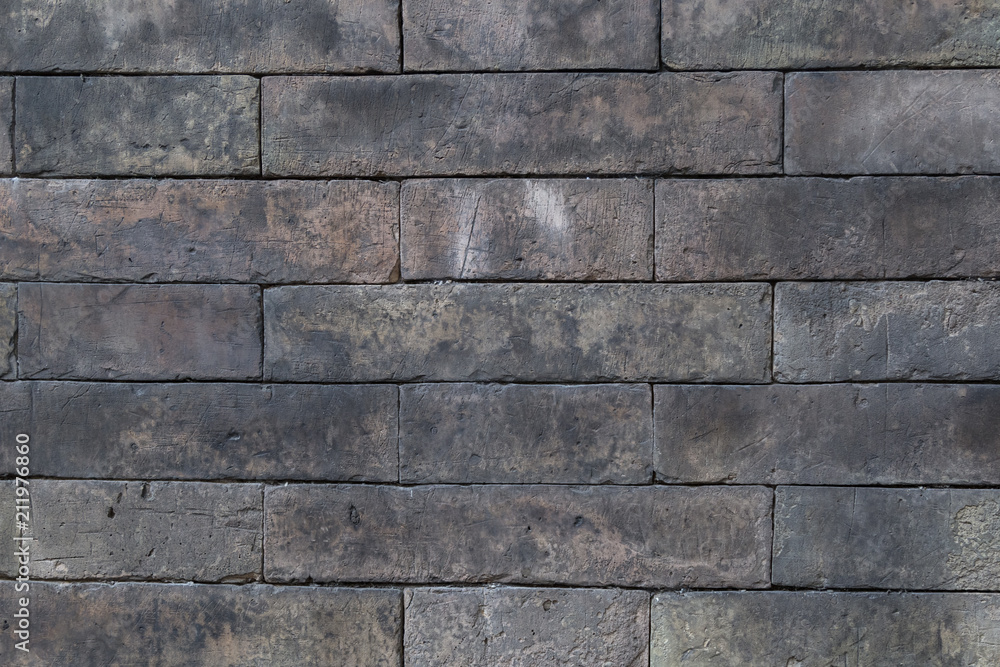 Background of aged grey color brick wall texture Background of aged grey color brick wall texture