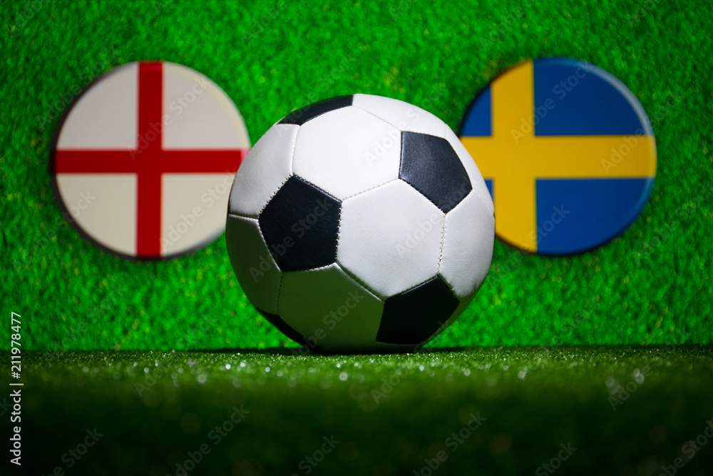 Fototapeta premium Soccer 2018. Creative concept. Soccer ball on green grass. Support your country or cheer concept.