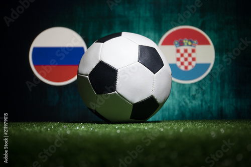 Soccer 2018. Creative concept. Soccer ball on green grass. Support your country or cheer concept.