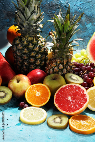 Fototapeta Naklejka Na Ścianę i Meble -  Fresh organic fruits background. Healthy eating concept.