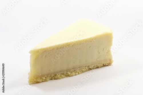 One piece of the yummy cheesecake isolated on a white background
