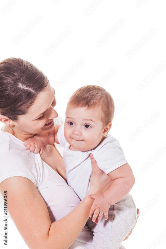 Close up view of attractive young mother with her baby Close up view of attractive young mother with her baby