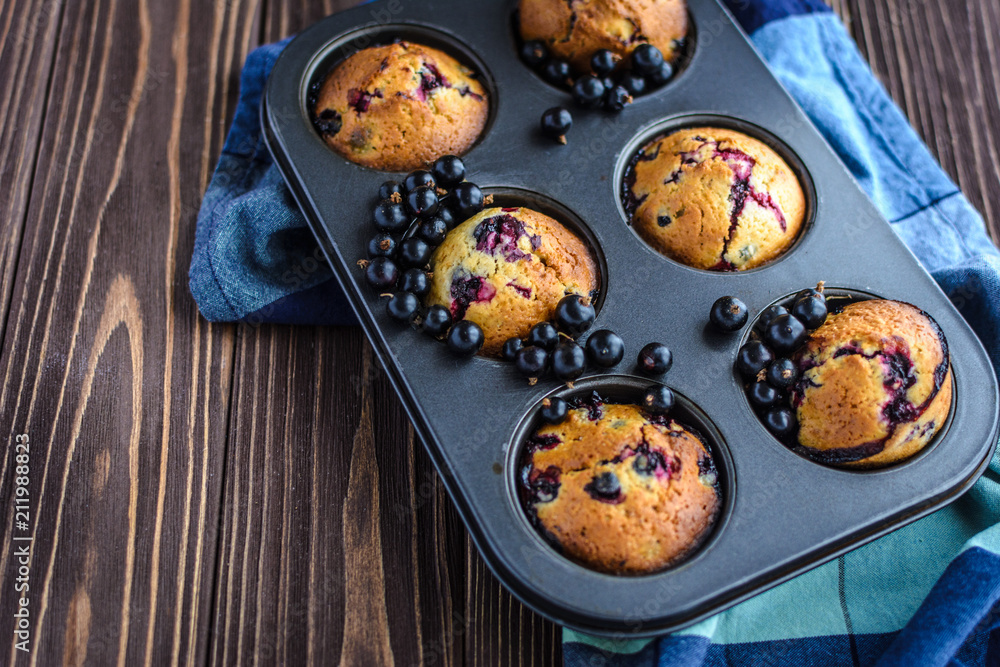 Homemade delicious muffins with fresh berries 
