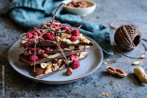 Chocolate bark with hazelnuts, peanuts, cranberries and freeze dried raspberries