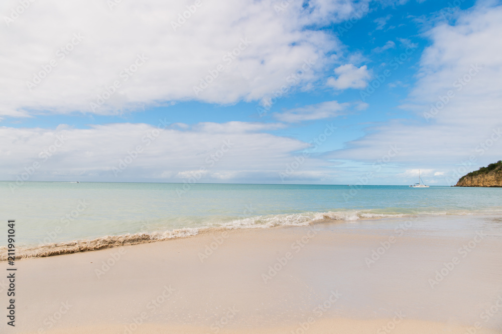 Idyllic scene sand tropic beach wave blue sea. Everyone should visit tropic resort st.johns antigua. Top list vacation resorts. Travel tropic island vacation. Stunning beauty tropic environment