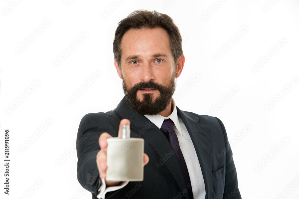 How to pick right fragrance. How to choose best perfume for men according to occasion. Which is best fragrance for business men. Man bearded handsome businessman hold bottle perfume defocused How to pick right fragrance. How to choose best perfume for men according to occasion. Which is best fragrance for business men. Man bearded handsome businessman hold bottle perfume defocused