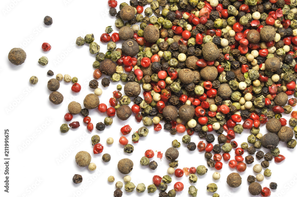 Black, red and white pepper grains isolated on white. Spice. Food. Black, red and white pepper grains isolated on white. Spice. Food.