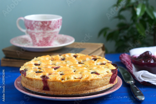 A traditional American or European cherry pie made of shortcake. Rustic style.