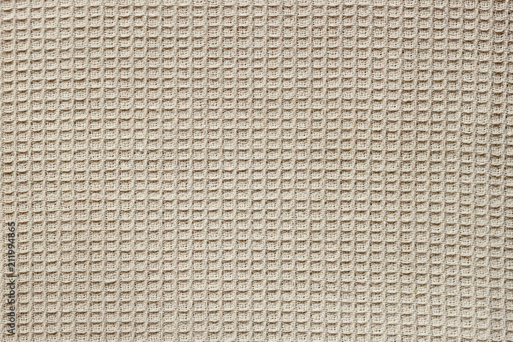 Waffle fabric with visible texture copy space for text, web print design  elements. Closeup of light natural cotton texture pattern for backdrop  Stock Photo