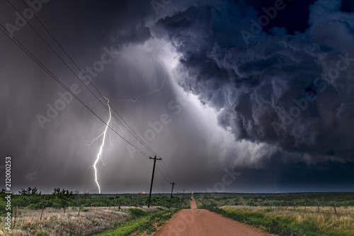 Lightning storm over field in Roswell New Mexico photo