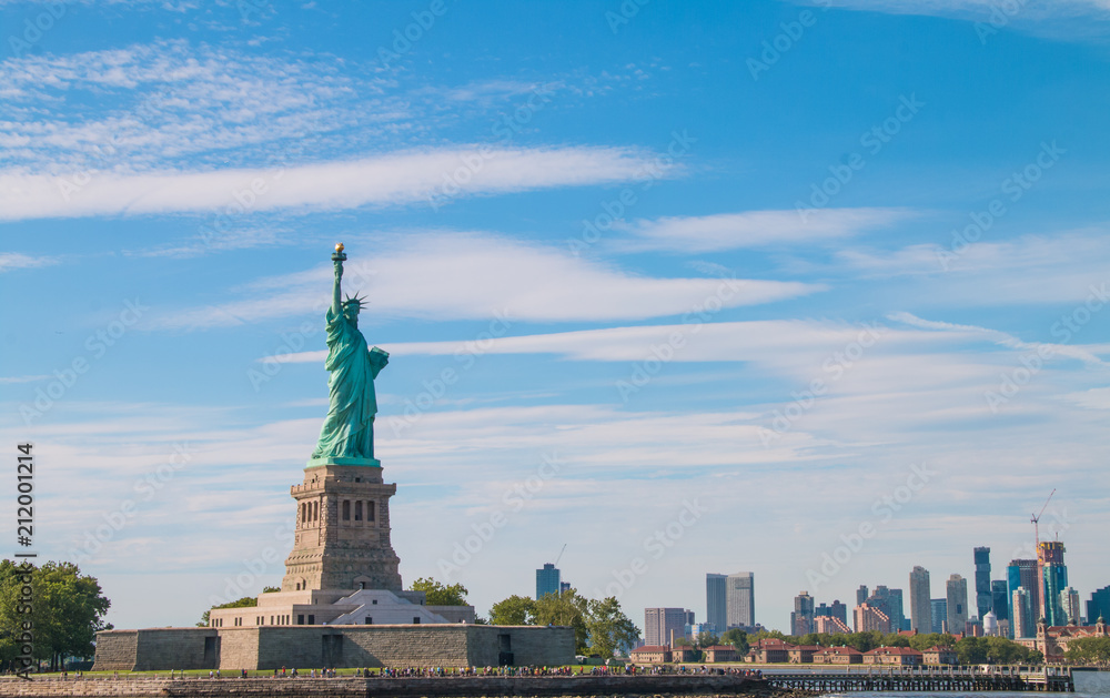 The statue of liberty in New York Harbor. The statue of liberty in New York Harbor.
