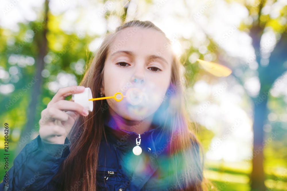 Girl play with soap bubbles. Girl play with soap bubbles.