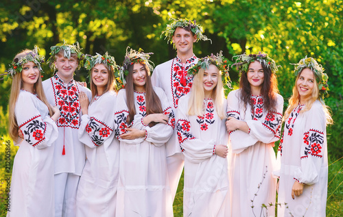 Midsummer. A group of young people of Slavic appearance at the celebration of Midsummer. photo