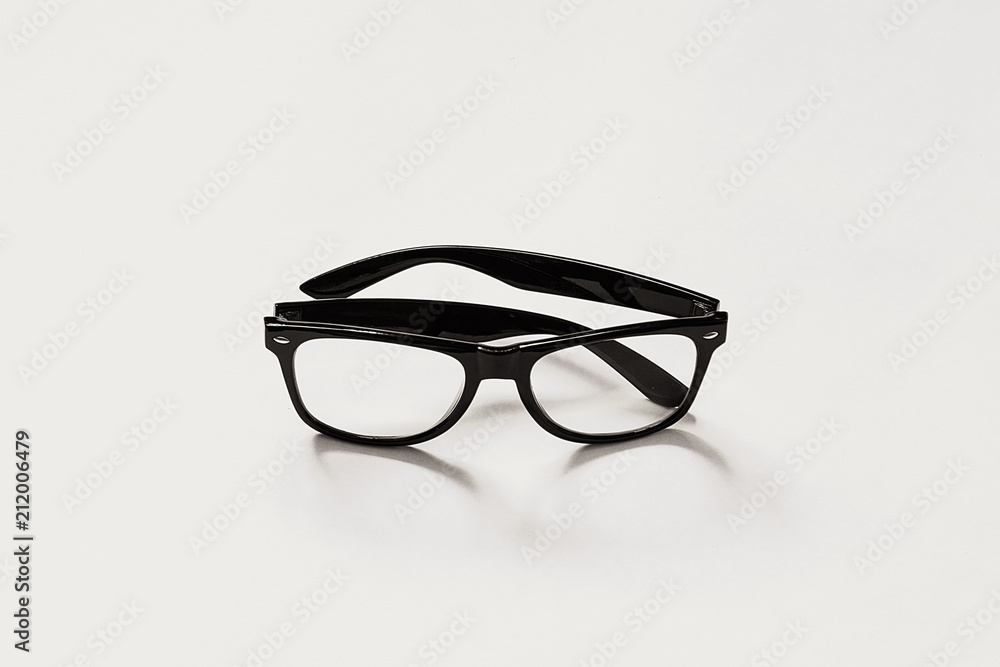 Black glasses on white background.Black frame on white background Black glasses on white background.Black frame on white background