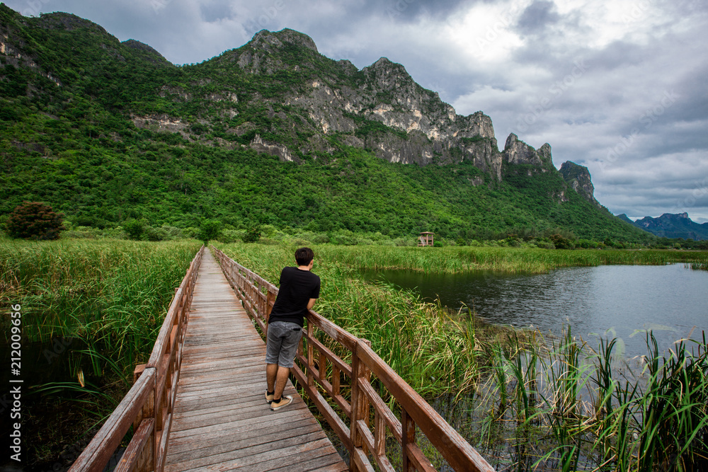 The wooden bridge overlooking the scenery at Sam Roi Yod National Park. It is beautiful and surrounded by nature in Prachuap Khiri Khan, Thailand.